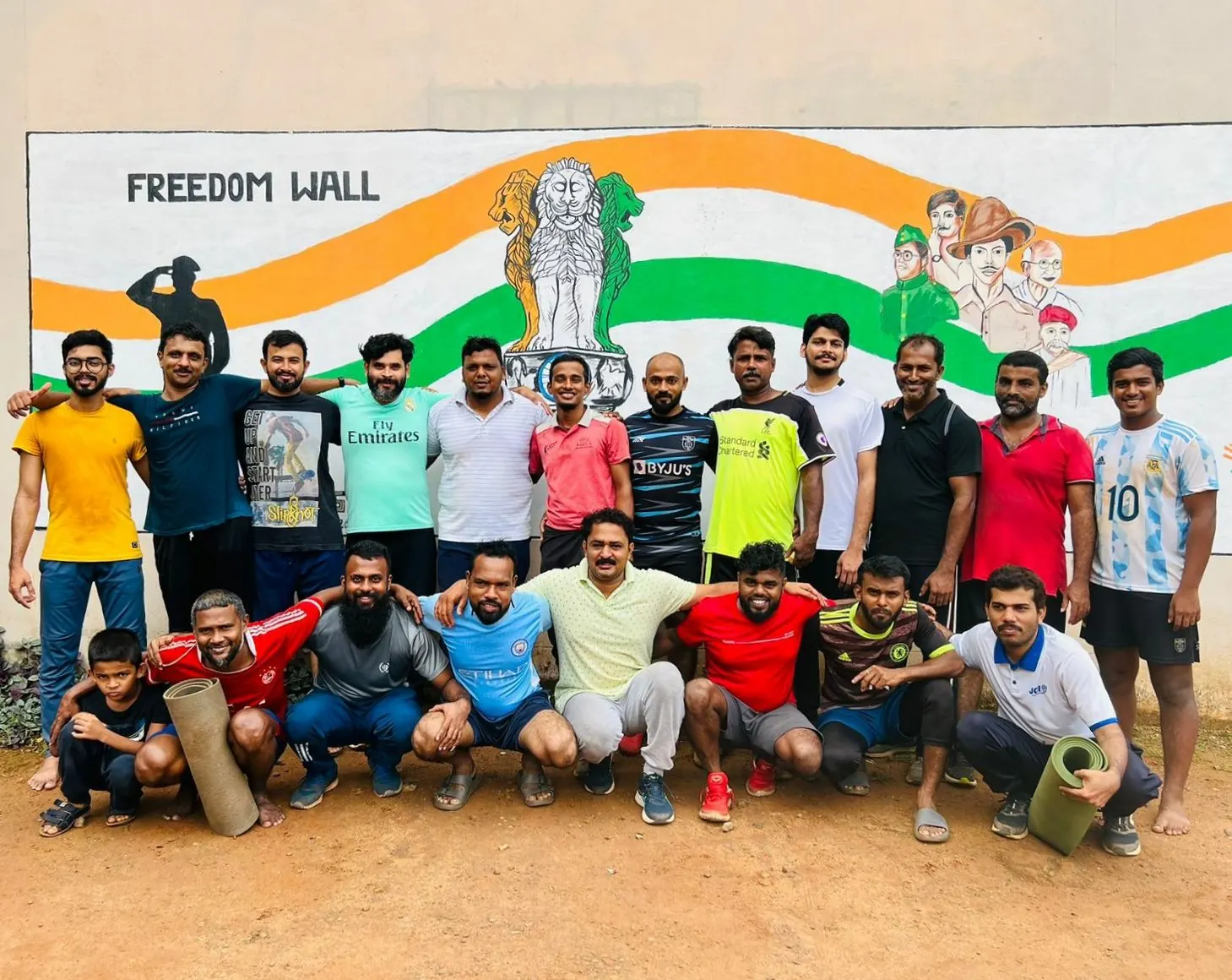 Large group of participants after a community training session